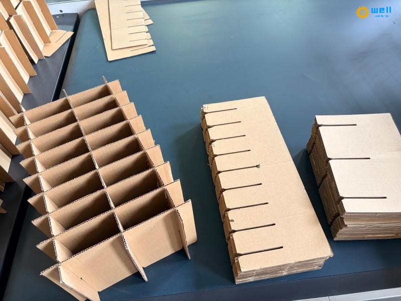 https://www.wd-cartonmachine.com/corrugated-carton-partition-assembly-machine-product/