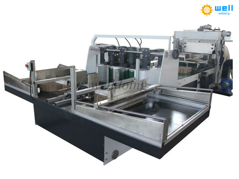 Regular maintenance of cardboard partition assembler machine