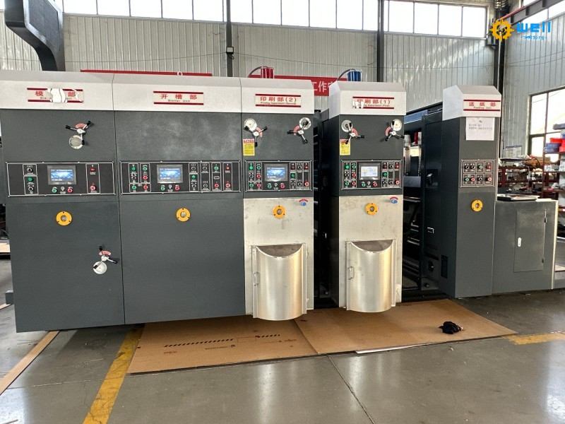 https://www.wd-cartonmachine.com/lead-eder-feeder-flexo-printer-die-cutter-slotter-machine-product/