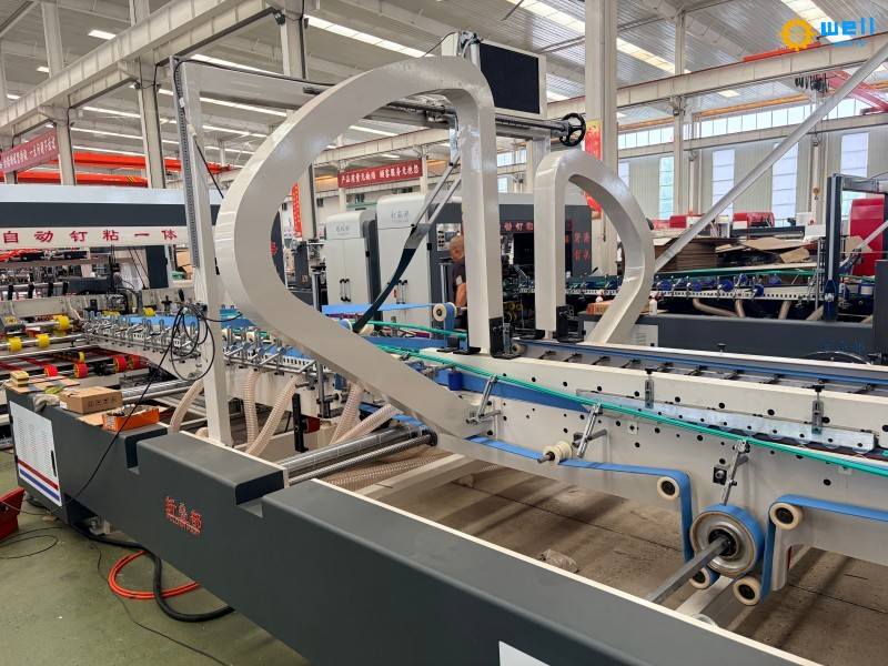 https://www.wd-cartonmachine.com/automatic-carton-box-nail-folding-gluing-equipment-product/