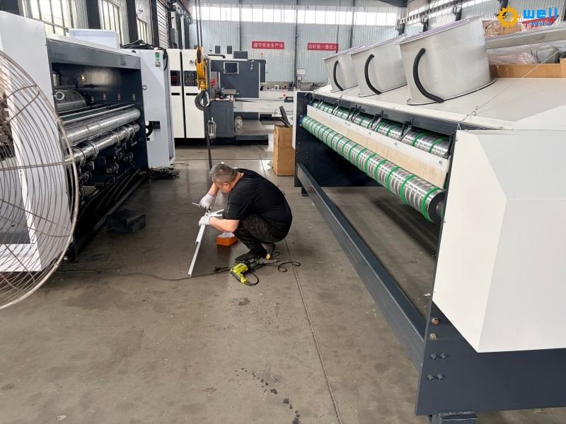 https://www.wd-cartonmachine.com/automatic-flexo-printing-die-cutting-slotting-machine-product/