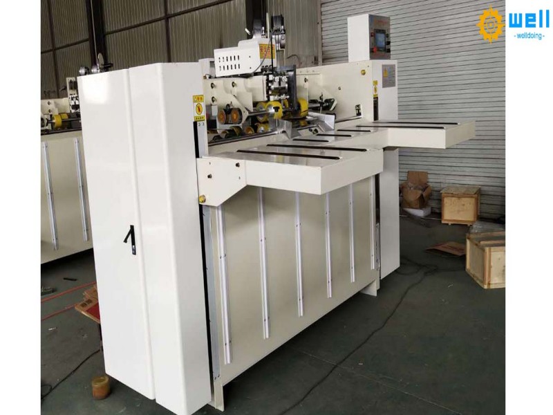 https://www.wd-cartonmachine.com/semi-automatic-box-stitch-machine-product/